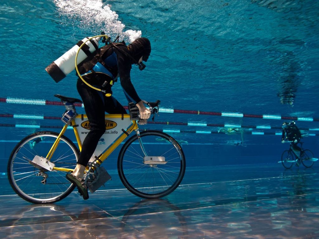 Jens completing his World Record breaking under water cycle cycling records