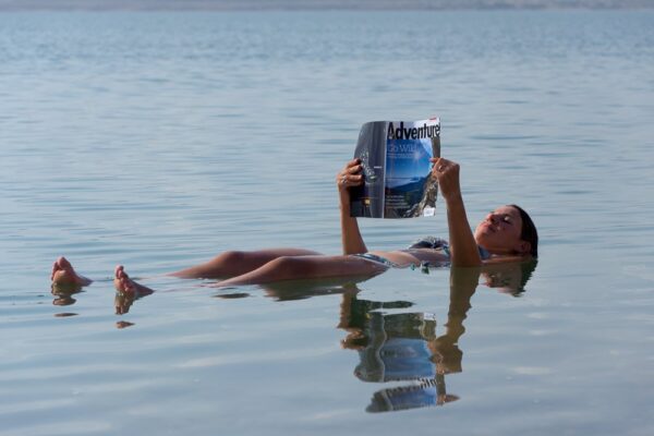 Emily floating in the Dead Sea