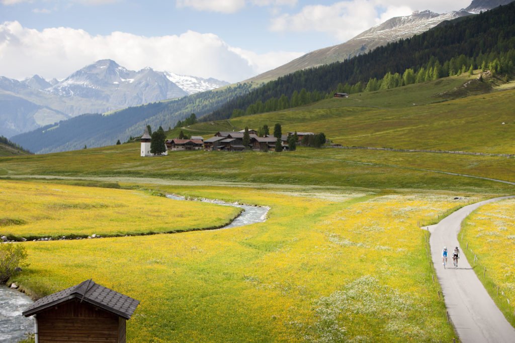 Exploring the cyclist’s paradise of Davos-Klosters. View of an Alpine meadow.