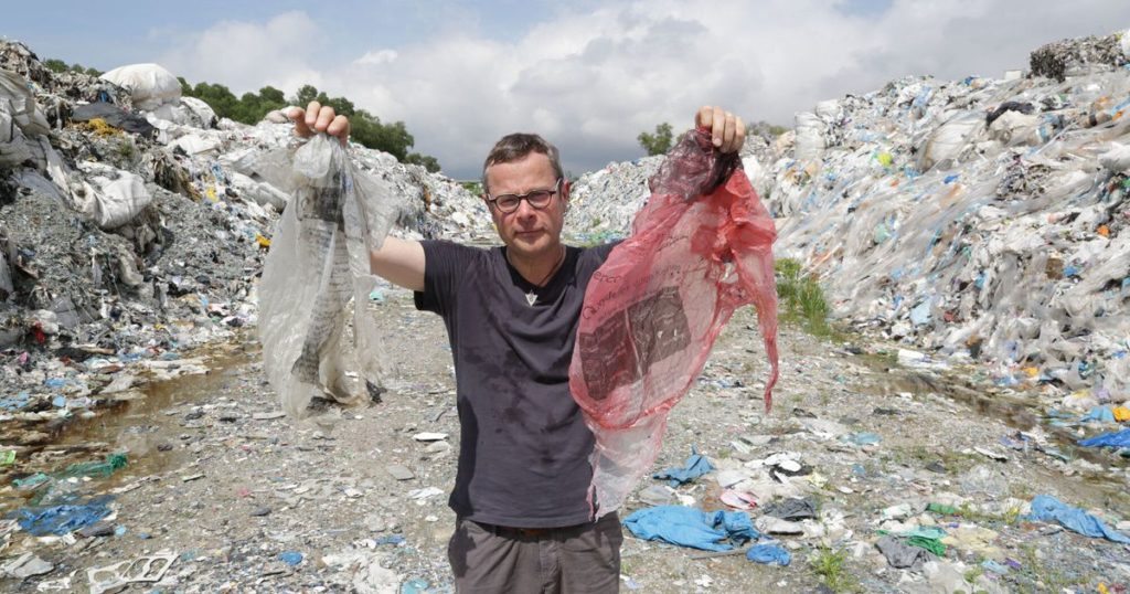 Hugh (presenter) holds plastic bags, landfill, sustainability in sport