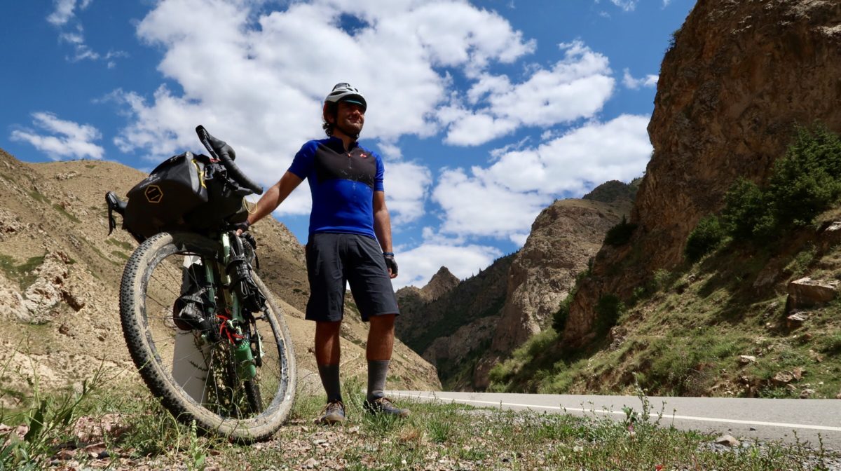 prepare for a bikepacking race - marcus at the top of the climb