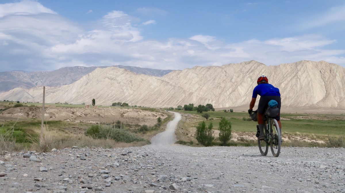 prepare for a bikepacking race - marcus riding to the hills