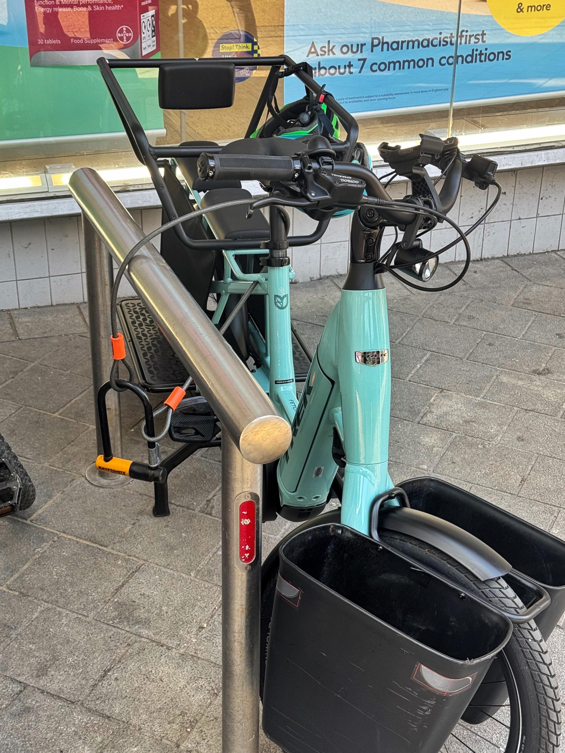A cargo bike locked using an accessory cable