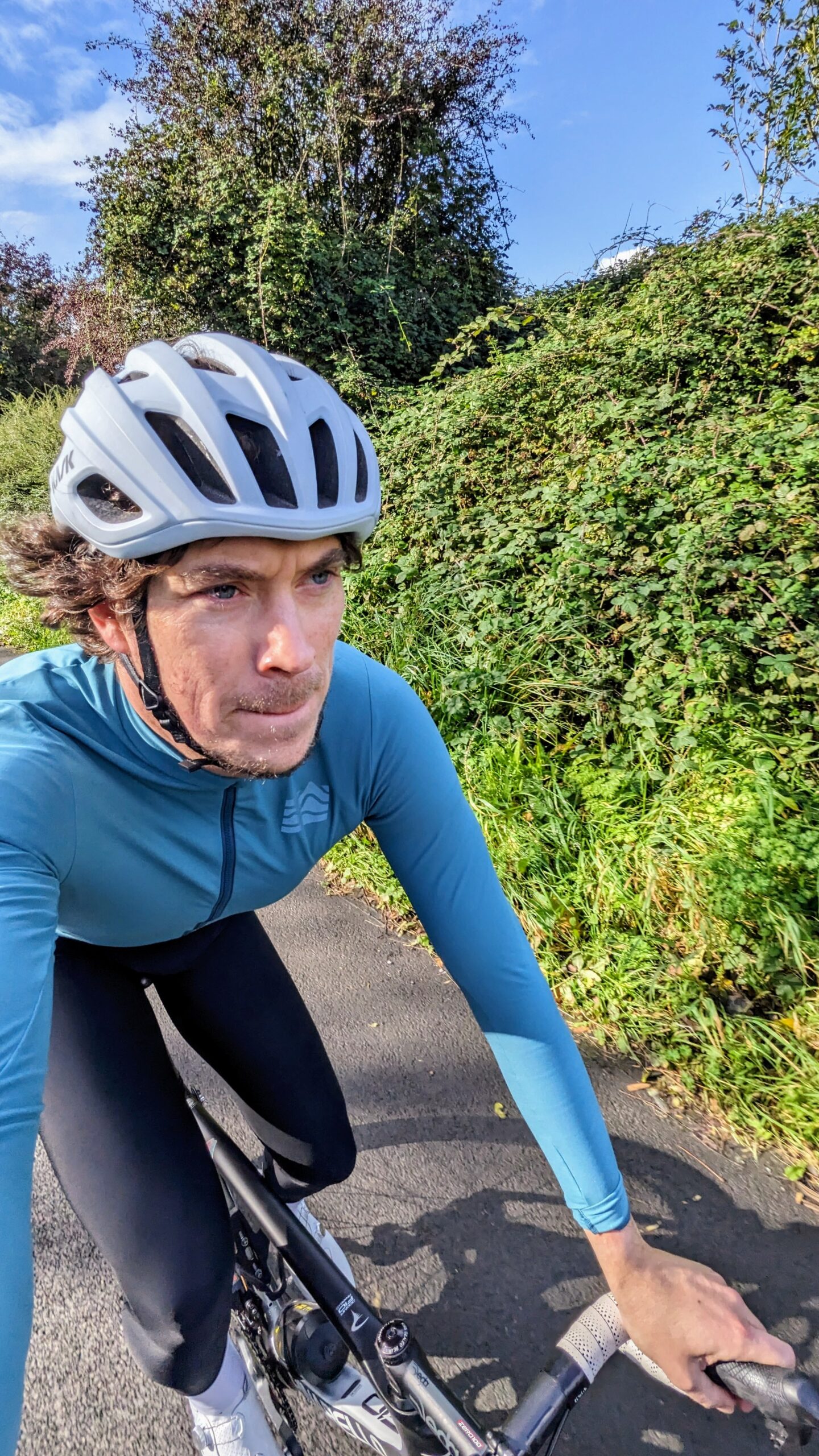 a cyclist riding in Autumn