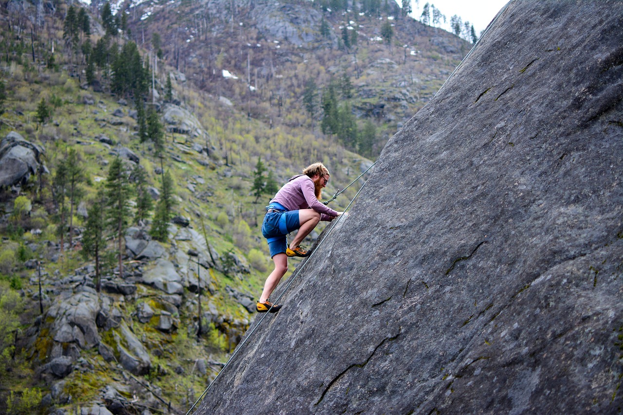 A Rock climber climbing slab